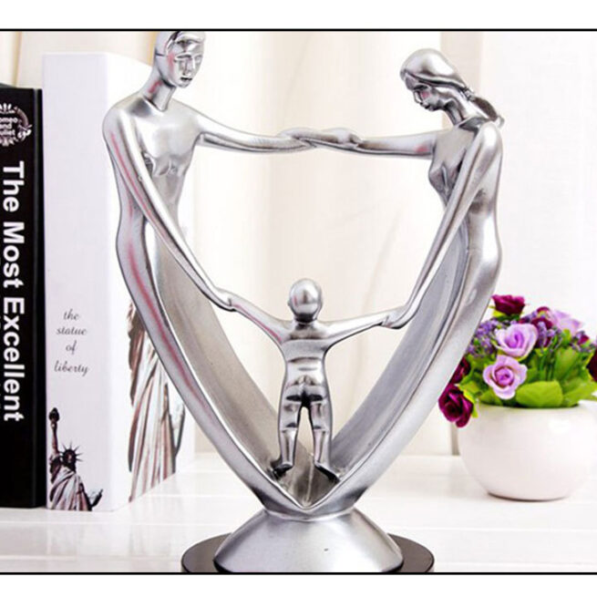 A Family Of Three Resin Ornaments And Crafts