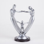 A Family Of Three Resin Ornaments And Crafts