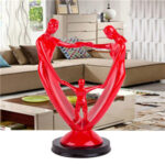 A Family Of Three Resin Ornaments And Crafts